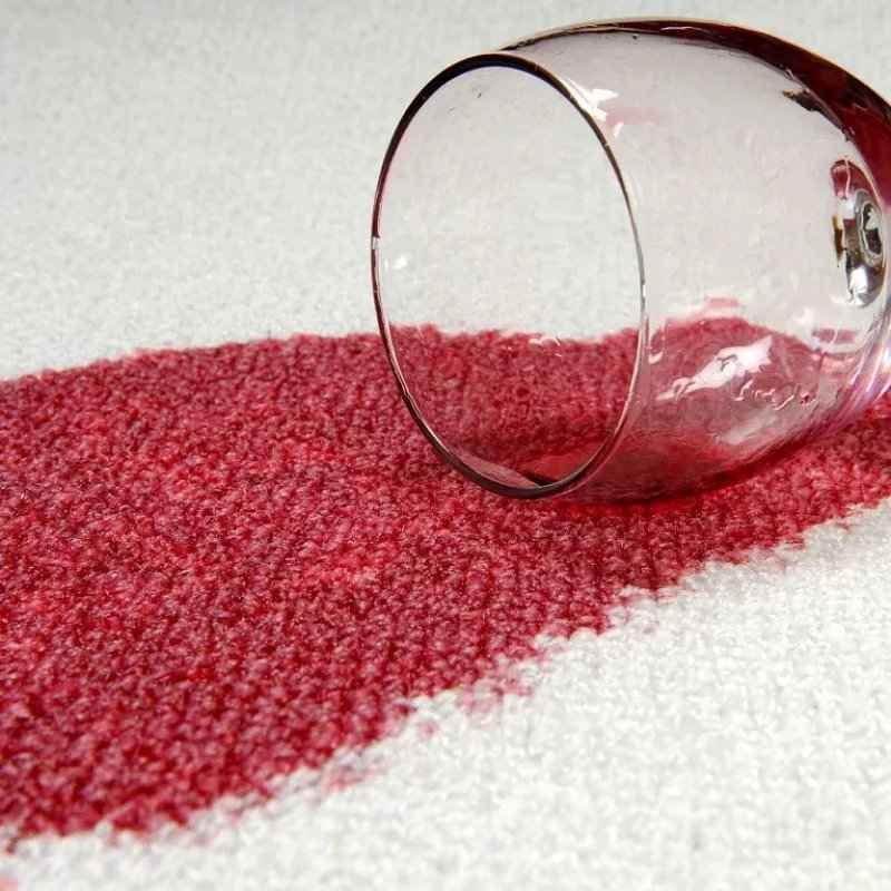 Wine stain on a white carpet